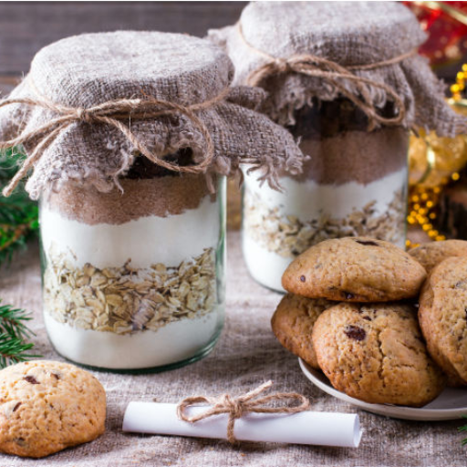 Decorated cookie jars with layered ingredients